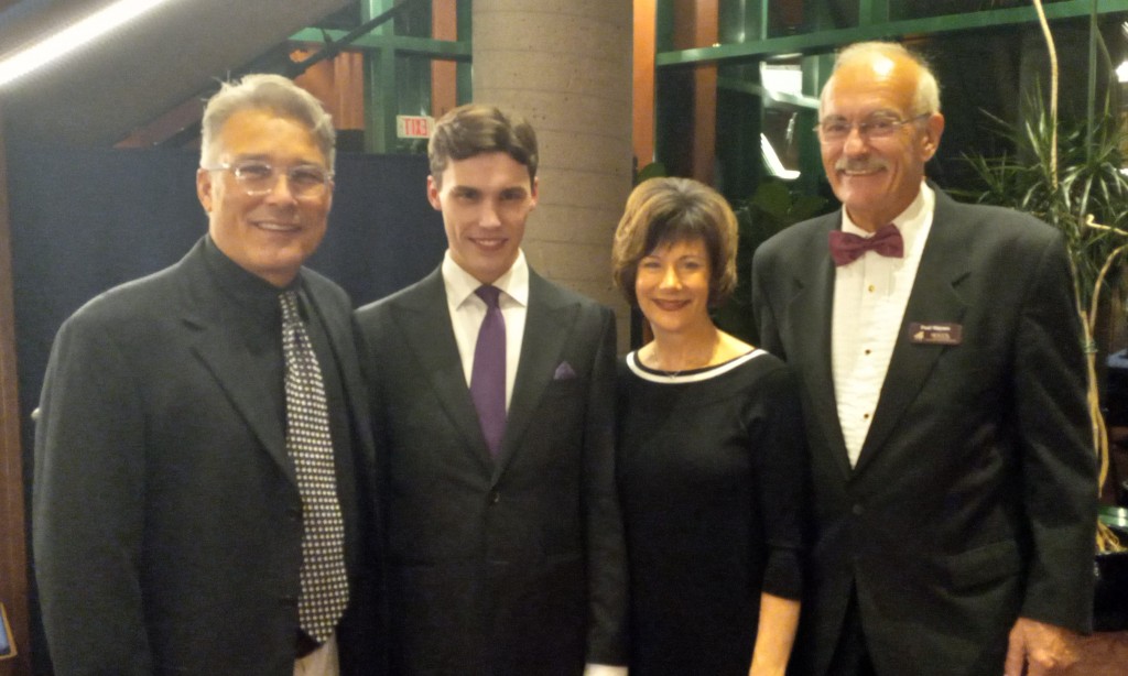 Jaeden Izik-Dzurk with his parents and NOCCA president Paul Maynes